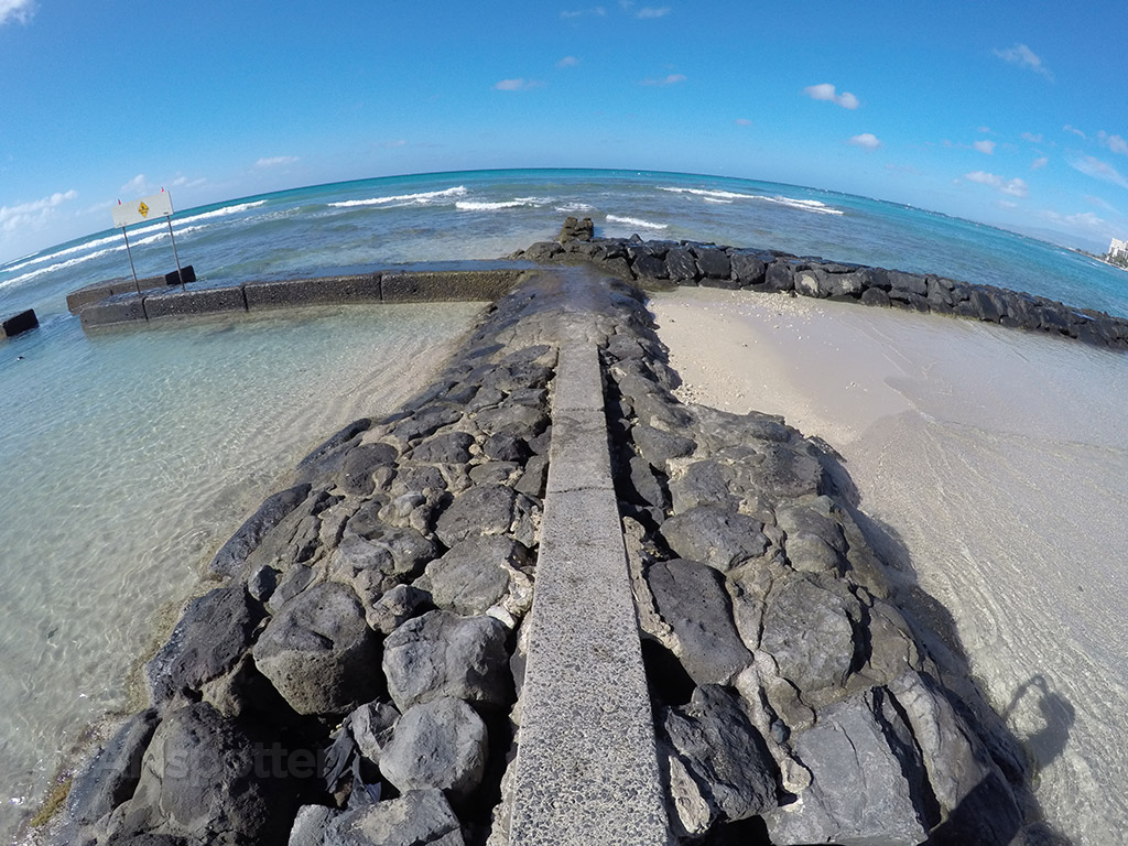 waikiki beach stone pier and break wall